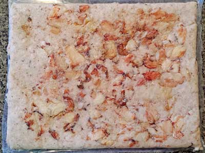 A photograph of Seatech's rock crab meat fancy pack 20/80 5 pound pillow pack.