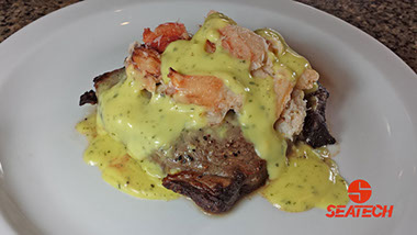 A photograph of Chilean crab meat steak oscar.