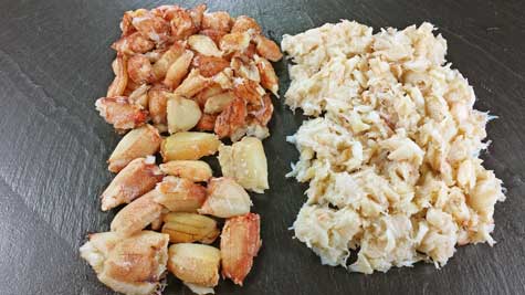 A photograph of plump and juicy Chilean crab claw and leg meat next to handpicked body meat.